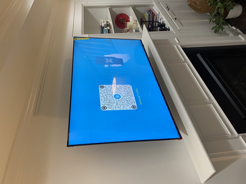 Above-fireplace installation completed by Ensysta Build